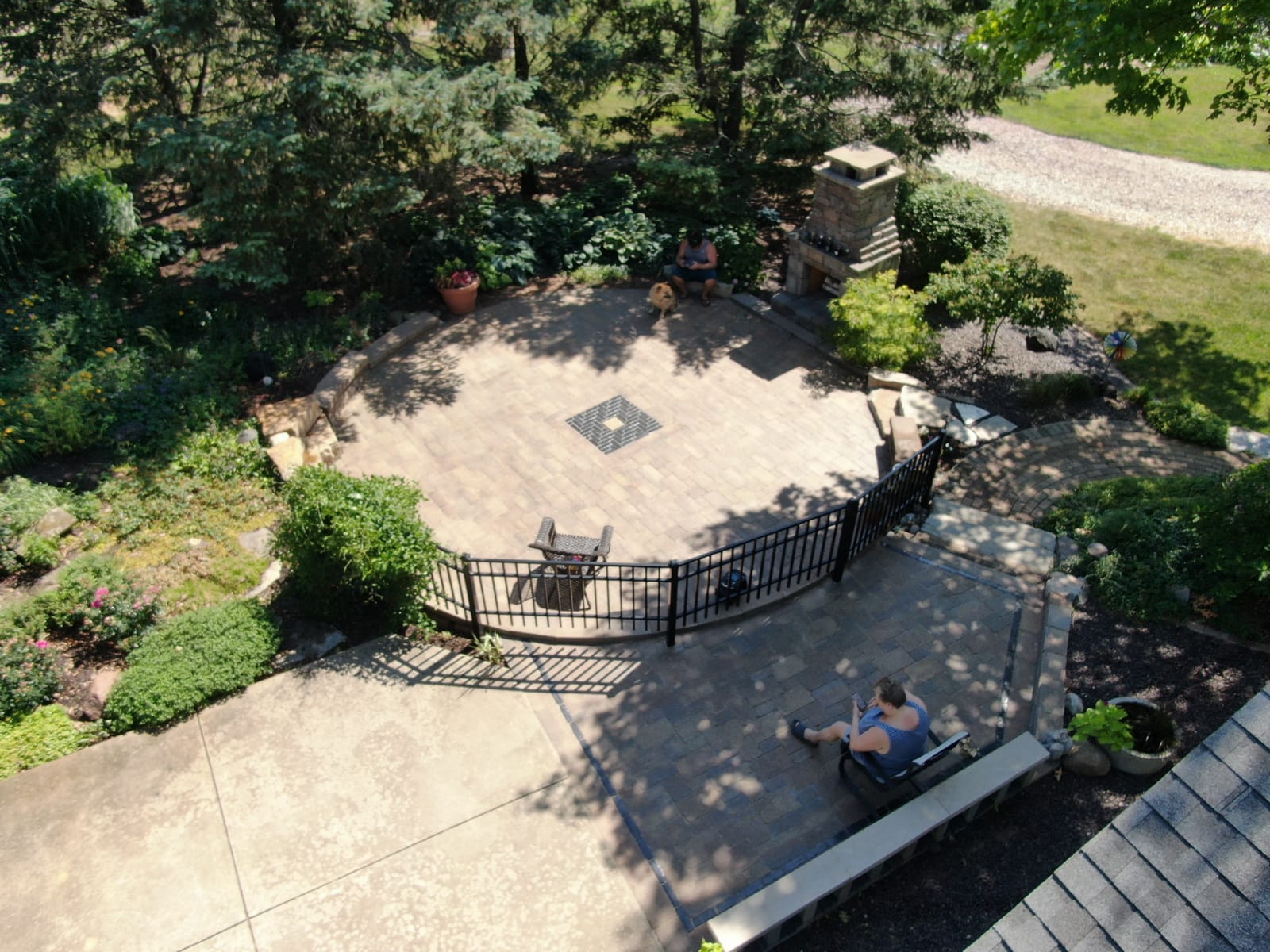 Finished patio with fireplace - drone view